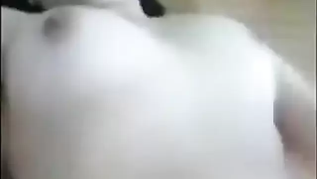 Asian teen gives a gentle handjob